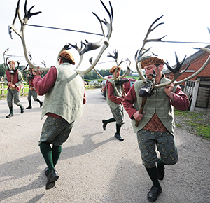 Image shows the quirky Abbots Bromley Horn Dance in Staffordshire