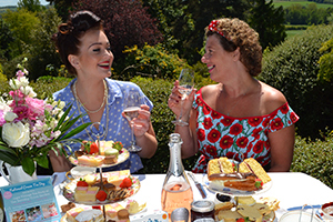 Two ladies enjoy a vintage afternoon tea at the Dorothy Clive Garden tea room, Staffordshire