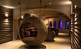 One of the spa pods at Hoar Cross Hall - a large sphere with cushions and mattress, offering private space for relaxing between treatments