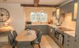 The rustic kitchen/dining area at Orchard Barn