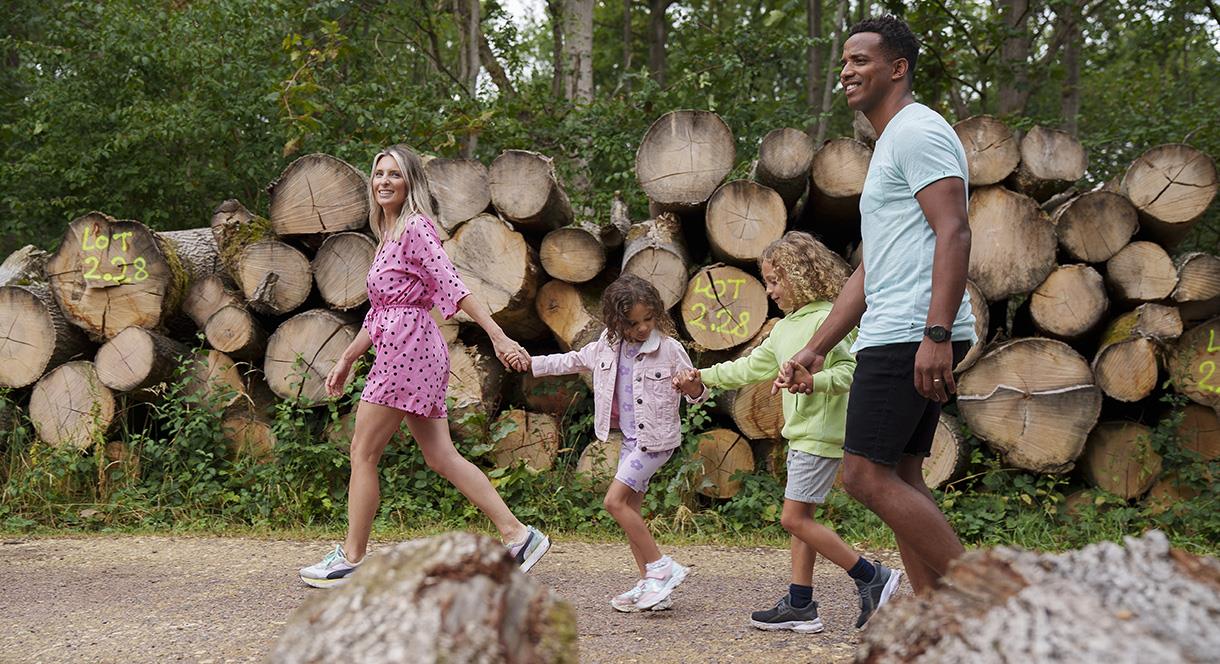 Image shows a family enjoying a summer walk
